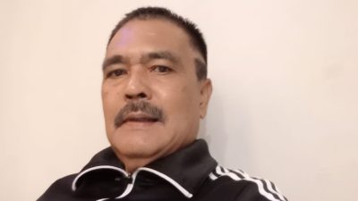 Pengacara  Karawang  DR. Maruli  Manullang, SH, SE, MM, MBA  Bergaya Flamboyan